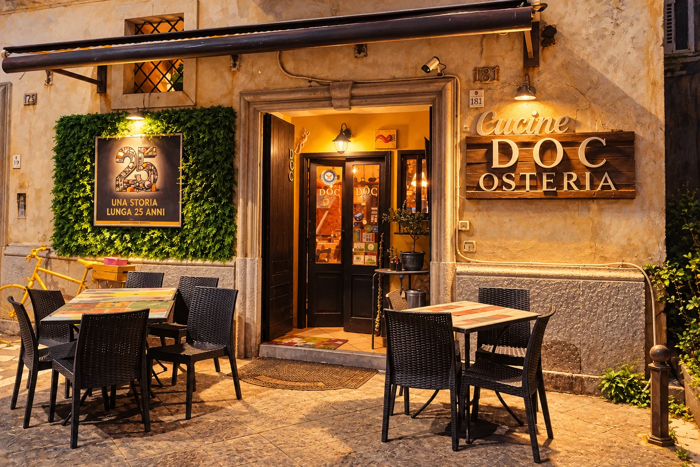 L’ingresso di Osteria DOC Pareres con i tavolini all’aperto, da una fotografia rielaborata
